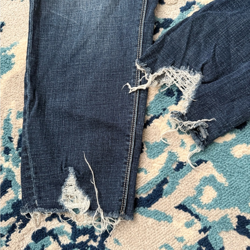 Distressed Blue Jeans